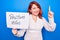 Young redhead woman asking for optimist attitude holding paper with positive vibes message smiling with an idea or question