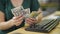 Young redhead woman business worker counting romanian leu banknotes at office