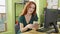 Young redhead woman business worker throwing romanian leu banknotes on table at office