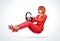 Young redhead woman in red suit driver car with steering wheel, auto concept