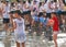 Young revellers during water battle in Santa Maria in mallorca detail