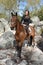 Young rider in forest