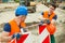 Young road construction workers