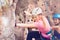 Young rock climber in helmet training outdoors