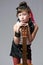 Young rocker posing with guitar