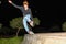 A young roller practicing tricks on the skating rinks