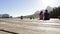 Young Romantic Couple Sitting On End Of Wooden Jetty By Lake