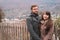 Young romantic couple standing on top of the hill