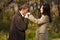 Young romantic man kissing girls hand