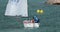 Young Sailor on Optimist Yacht Dinghy
