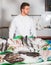 Young salesman offering fresh fish