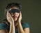 Young scared and blindfolded Asian Chinese teenager girl lost and confused playing dangerous internet viral challenge on