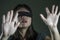 Young scared and blindfolded Asian Korean teenager girl lost and confused playing dangerous internet viral challenge on