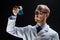 Young scientist holding test flask with chemical