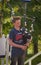 A young scotish boy playing traditional bagpipe at Portree, Scotland