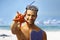 Young scuba diver with sea star