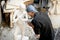 A young sculptor makes a sculpture.