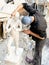 A young sculptor makes a sculpture.