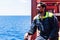 Young seafarer on the cargo ship.