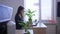 Young secretary woman working at laptop in office