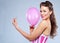 Young Sensuous Woman With Balloon And Pin