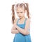 Young seven years old brunette girl in blue dress on a white iso