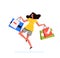 Young shopping woman holds packages from the store in her hands and jumps happily. The concept of a successful purchase