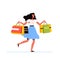 Young shopping woman holds packages from the store in her hands and jumps happily. The concept of a successful purchase