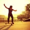 Young skateboarder legs skateboarding at skatepark