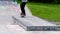 Young skateboarder skating the outdoor skatepark