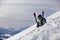 Young skier relaxing at beautiful sunny winter day