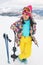 Young skier wearing winter sport clothes