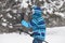 Young skiing and making a selfie in winter time