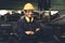 Young skillful factory worker or engineer close up portrait in factory