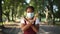 Young slim African American woman in coronavirus face mask gesturing no crossing hands in slow motion standing in