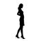 Young slim girl in short summer dress standing, profile, side view. Isolated vector silhouette