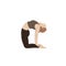 Young slim woman doing yoga exercise. Ustrasana asana, camel pose