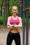 Young slim woman sports portrait on the training ground