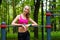 Young slim woman sports portrait on the training ground