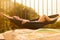 Young slim woman in tropical exotic hammock sunset lights