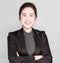 Young smart beautiful asian business woman wore black suit and glasses,smart and thinking holding Document, talking phone