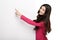 Young smile woman pointing at a blank board