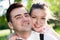 Young smiling couple in love portrait in summer park