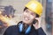 Young Smiling Engineer on the Phone wearing a Hardhat, On Site