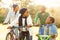 Young smiling family doing a bike ride