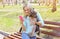 Young smiling girl owner with yorkshire terrier dog