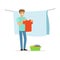 Young smiling man hanging wet clothes out to dry, house husband working at home vector Illustration