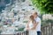 Young smiling tender romantic couple in Positano, Italy