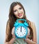 Young smiling woman hold watch. Beautiful smiling girl portrait