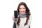 young smiling woman in scarf and arm warmers showing smartphone screen,